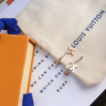 2025 Asymmetric Logo Earrings