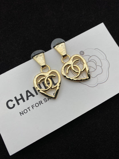 2025 Temperament Heart Hollow Earrings