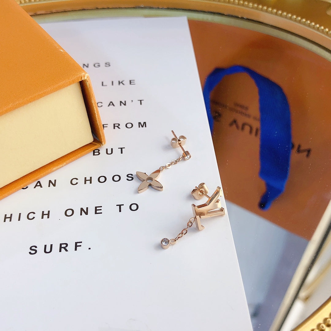 2025 Asymmetric Logo Earrings